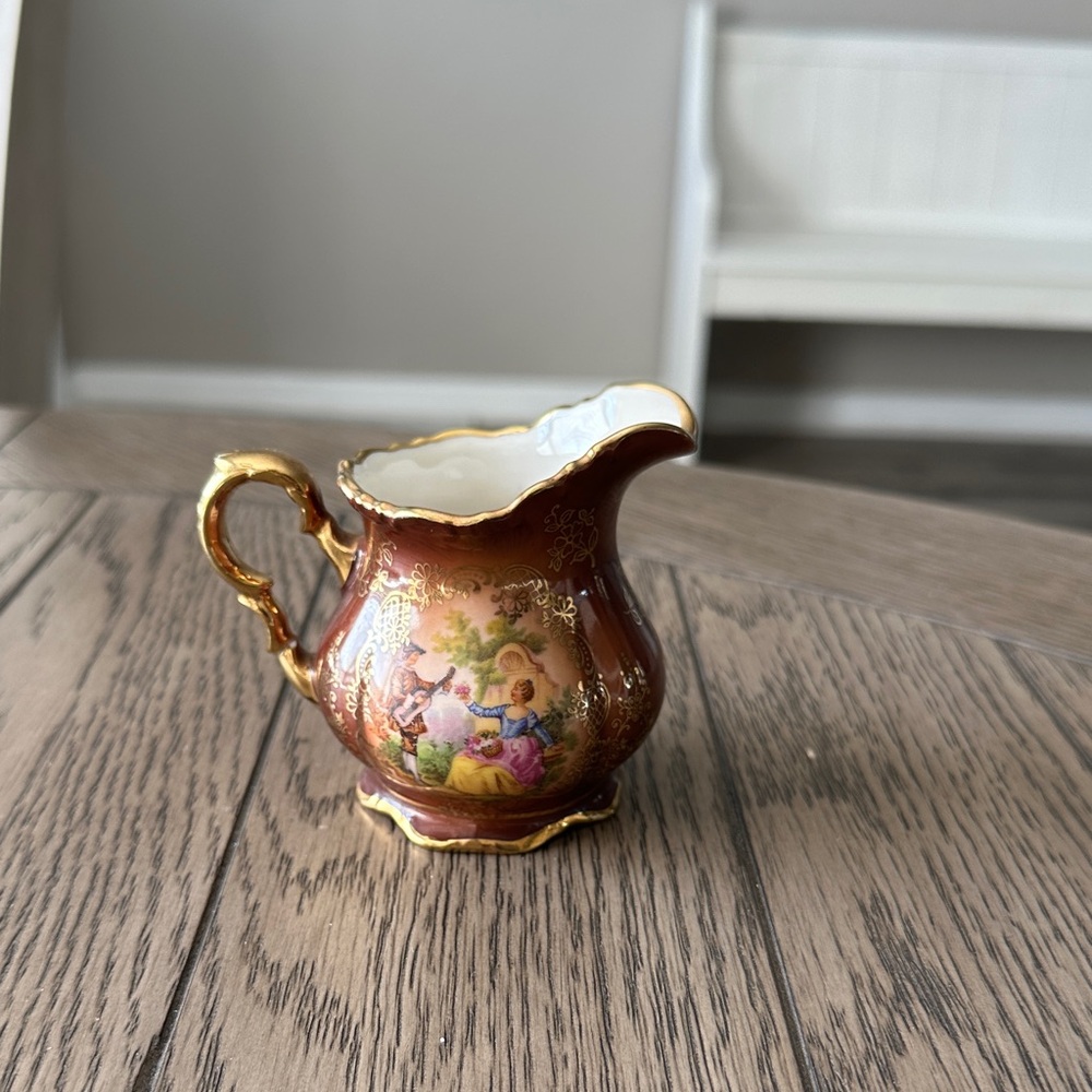 Elegant Gold and Brown Porcelain Pitcher